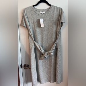 Grey Tshirt dress with tie around to cinch the waist.